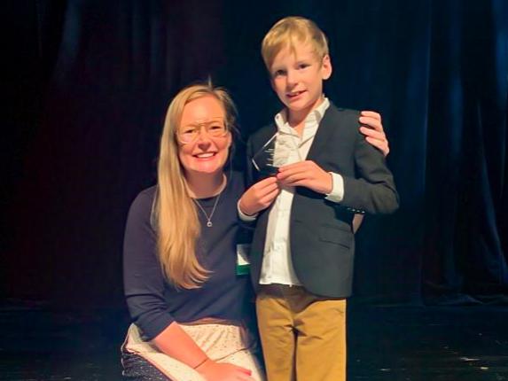 Nikki Crowley, Dorothy Foehr Huck and J. Lloyd Huck Early Career Chair in Neurobiology and Neural Engineering and assistant professor of biology and of biomedical engineering, with her son after receiving the Women to Watch: Class of 2023 award-Nikki Crowley honored with Women in STEAM Award by the Whitaker Center